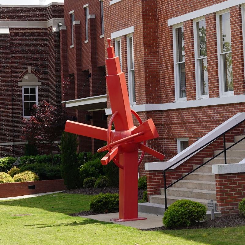 Red sculpture in front of Clayton Town Hall